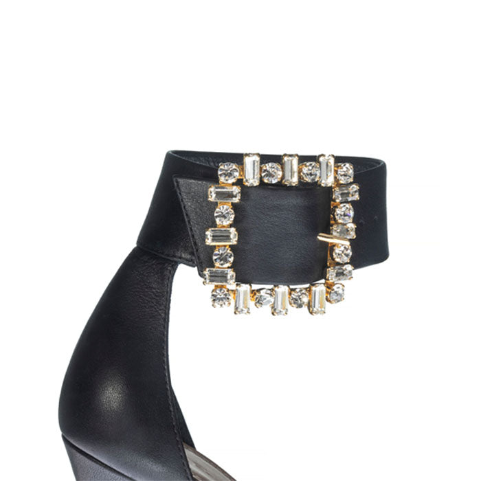 11cm Black Italian leather pumps with adjustable ankle strap with gold-plated buckle and Brass, Pearl Swarovski ornament.